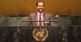 Man standing at podium at United Nations